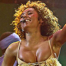 spice girl melanie brown oops nipple pops out on stage